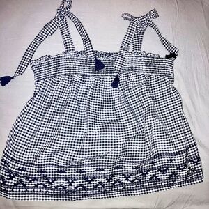 B/W gingham,  tassle-tie shoulders, embroidered hem, flowy smocked top. Small